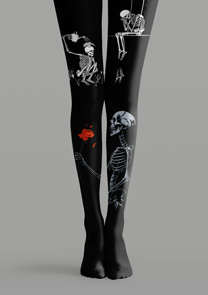 Black printed tights with white and gray skeletons, a red rose, a watering can and a skeleton seated on a swing.