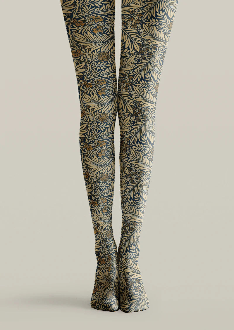 Navy printed tights with beige and brown flowers, sweeping leaves and dense botanical branches