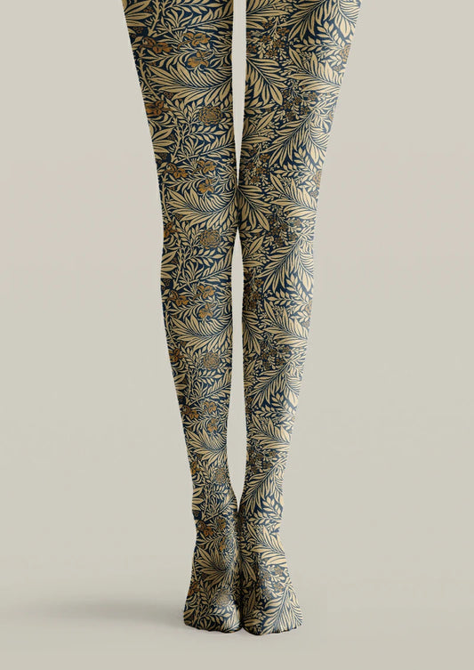 Navy printed tights with beige and brown flowers, sweeping leaves and dense botanical branches