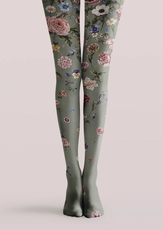 Gray printed tights with scattered pink, blue, and cream flowers and green botanical leaves.