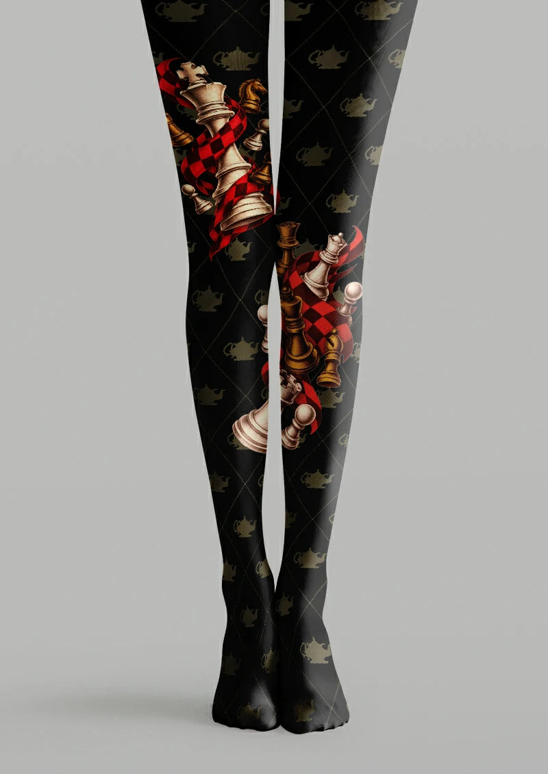 Black printed tights with chess pieces, red ribbons and diamond pattern details