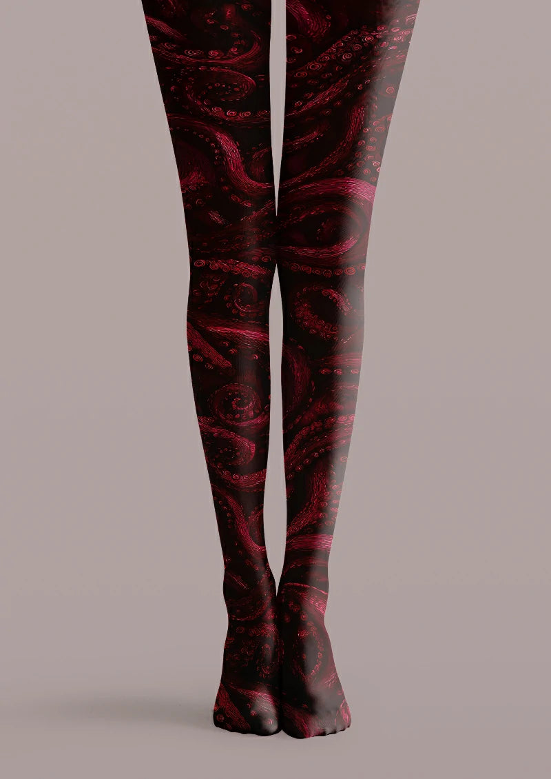 Black printed tights with curling red and burgundy octopus tentacles and visible suction-cup details