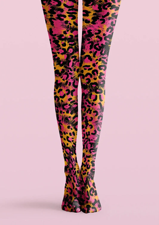 Black and pink printed tights with leopard rosettes, orange areas and radiating brushstroke-style details.