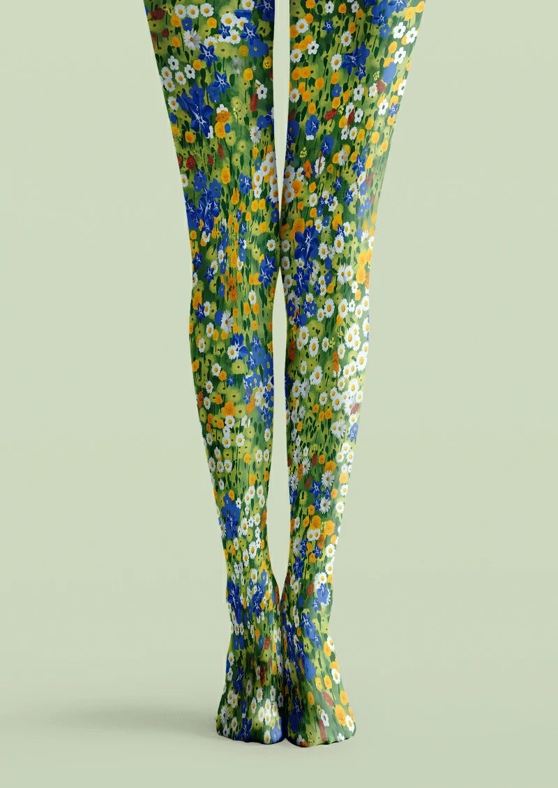 Green printed tights with white daisies, blue flowers, rounded yellow blooms and small leafy stems.