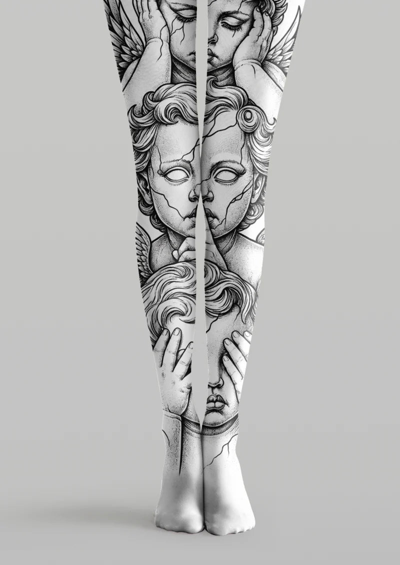 White printed tights with black cherub faces, wings, hands, and cracked statue-style linework across both legs