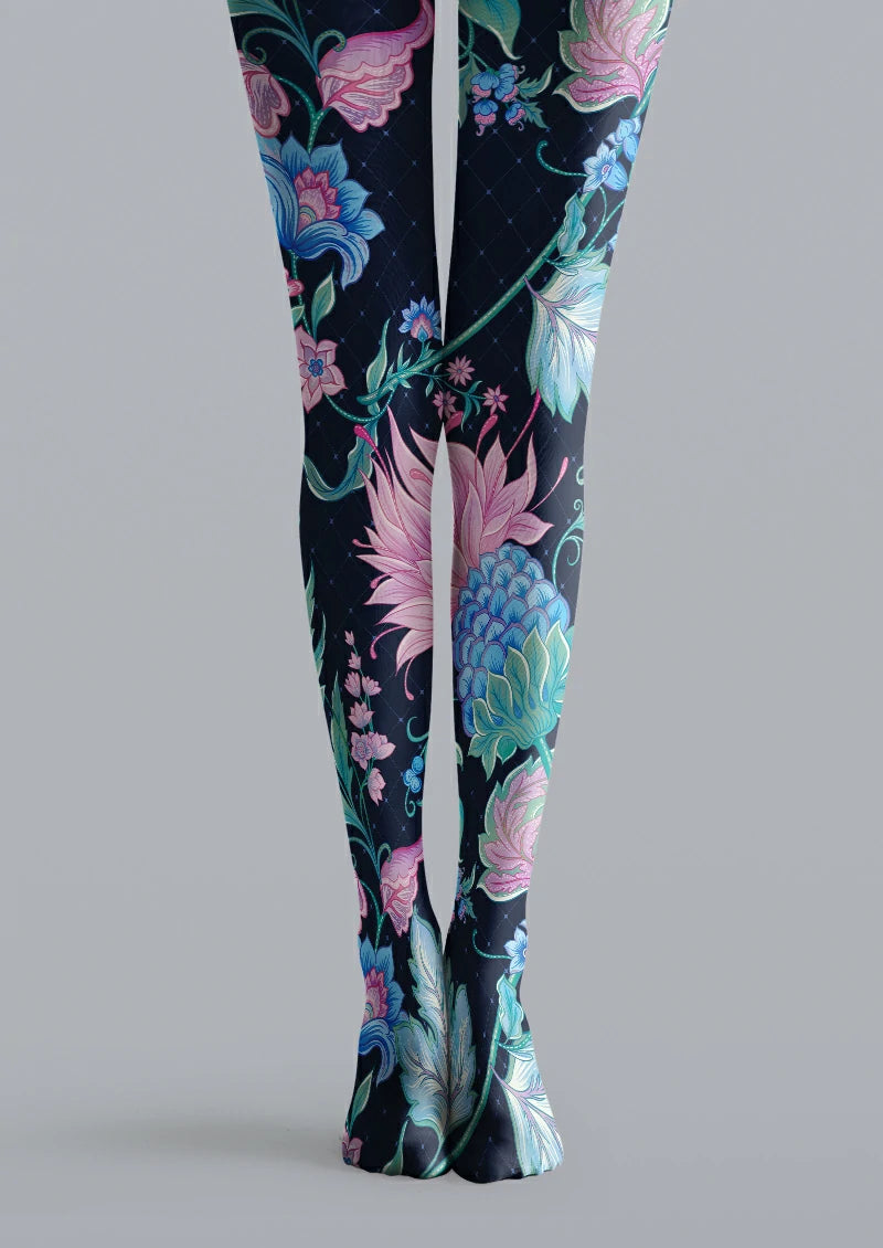 Navy printed tights with large pink, blue, and green flowers over a subtle diamond grid