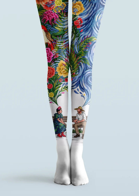 Multicolor printed tights with flowers, green foliage, blue swirls, a red bird, and illustrated figures across both legs