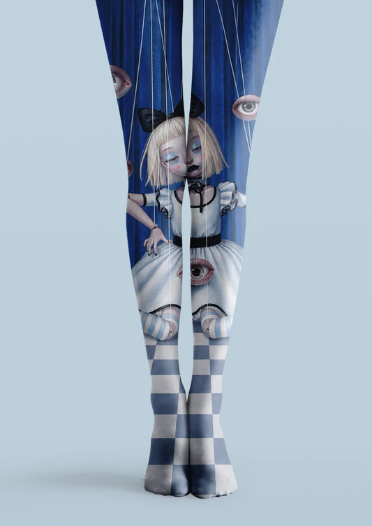 Blue printed tights with a puppet girl, floating eye motifs, curtain-like panels, and blue-white checkerboard lower legs