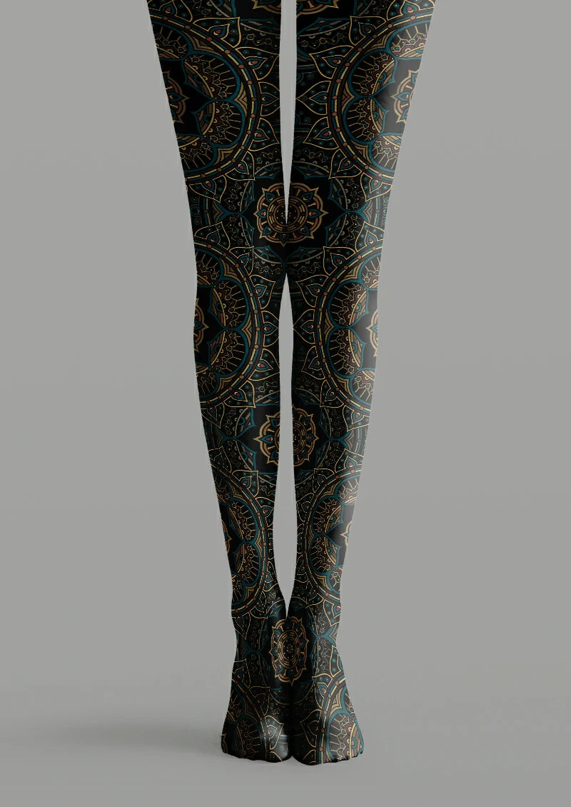 Black printed tights with blue and bronze mandala medallions, concentric rings, pointed sections and fine dotted details.