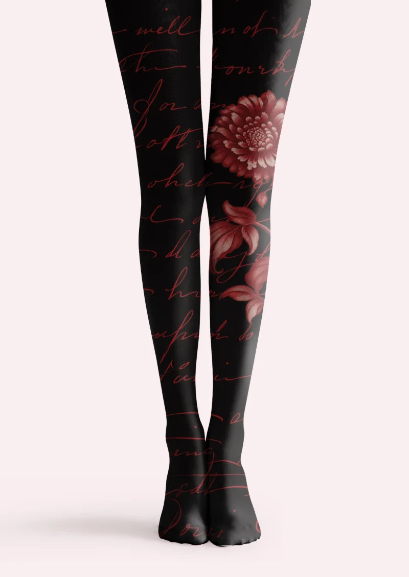 Black tights with burgundy cursive lettering and a large burgundy flower with leaves on one leg.
