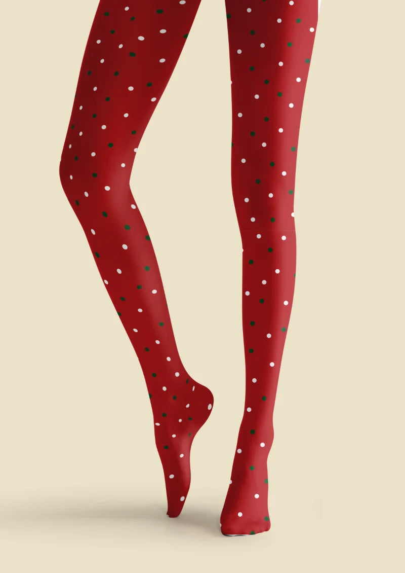 Red tights with small green and white polka dots across the legs and feet