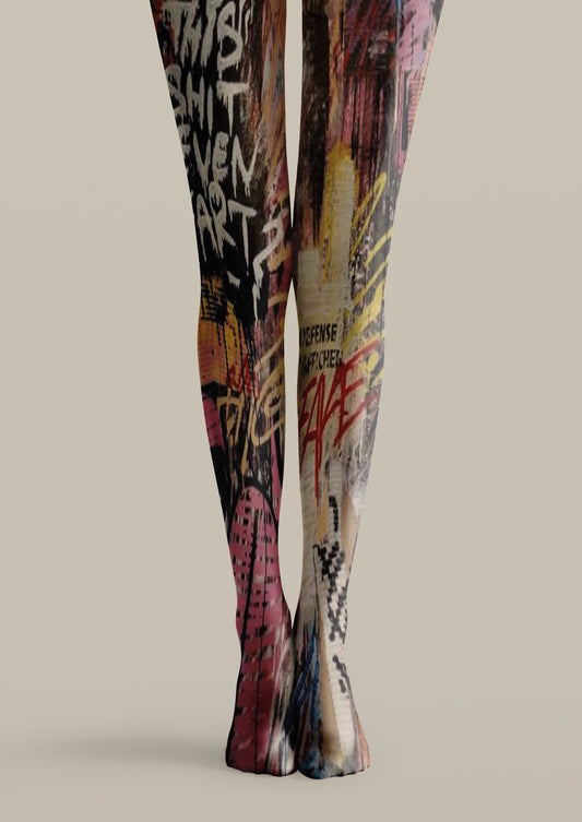 Black printed tights with graffiti lettering, red paint accents, distressed blocks, and abstract street-art graphics