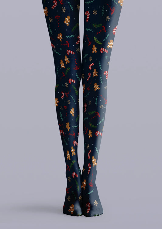 Navy Christmas tights with gingerbread figures, red candy canes, white snowflakes and green foliage