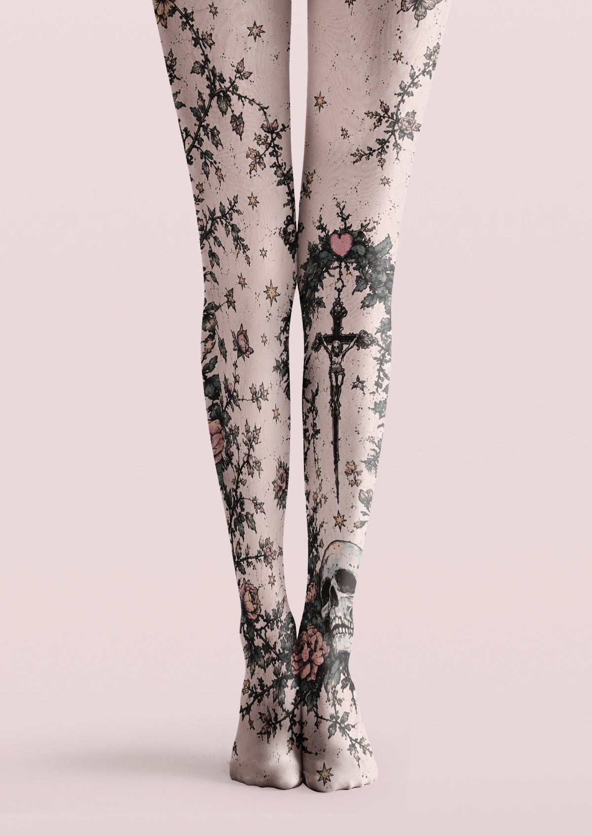 Pink printed tights with thorny roses, crucifix, skull, butterflies, stars, and gothic tattoo details