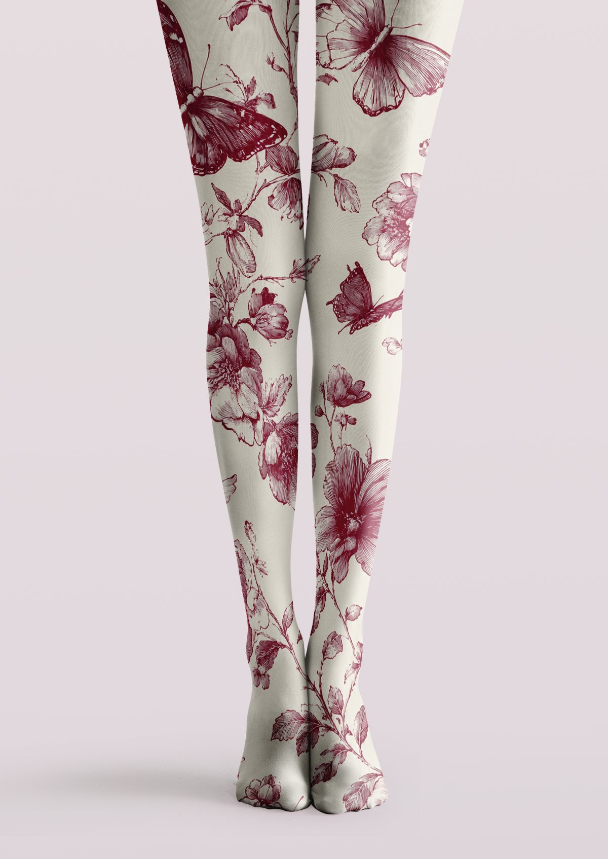 Ivory printed tights with burgundy flowers, botanical stems, and butterfly illustrations across both legs