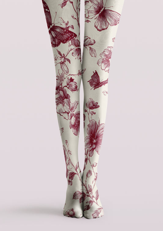 Ivory printed tights with burgundy flowers, botanical stems, and butterfly illustrations across both legs