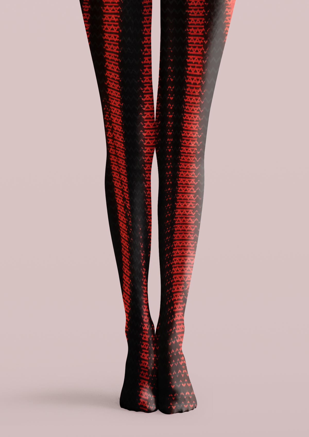 Black printed tights with repeating red geometric bands, triangles, and angular motifs across both legs