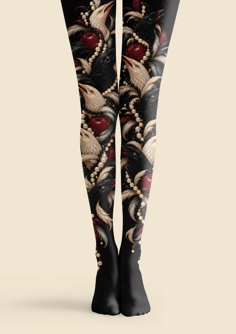 Black tights with black and ivory birds, pearl-like bead strands, burgundy apples and curling feather motifs