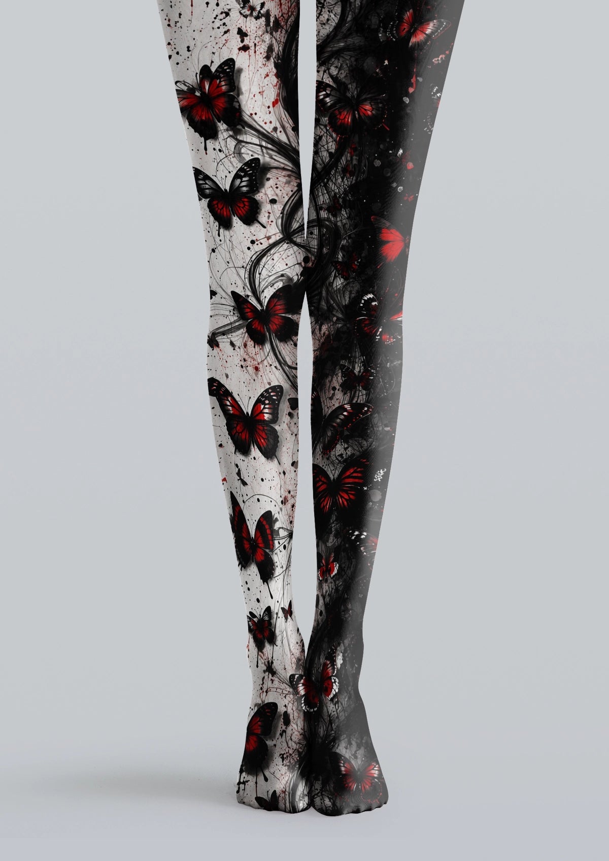 Black printed tights with red and black butterflies, ink textures, flowing branches, and gothic details