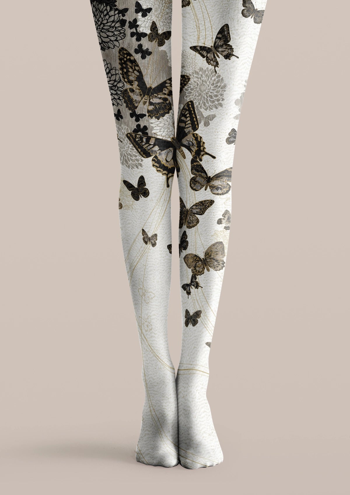 White printed tights with black and gray butterflies, fine gold-toned lines, and delicate floral details.
