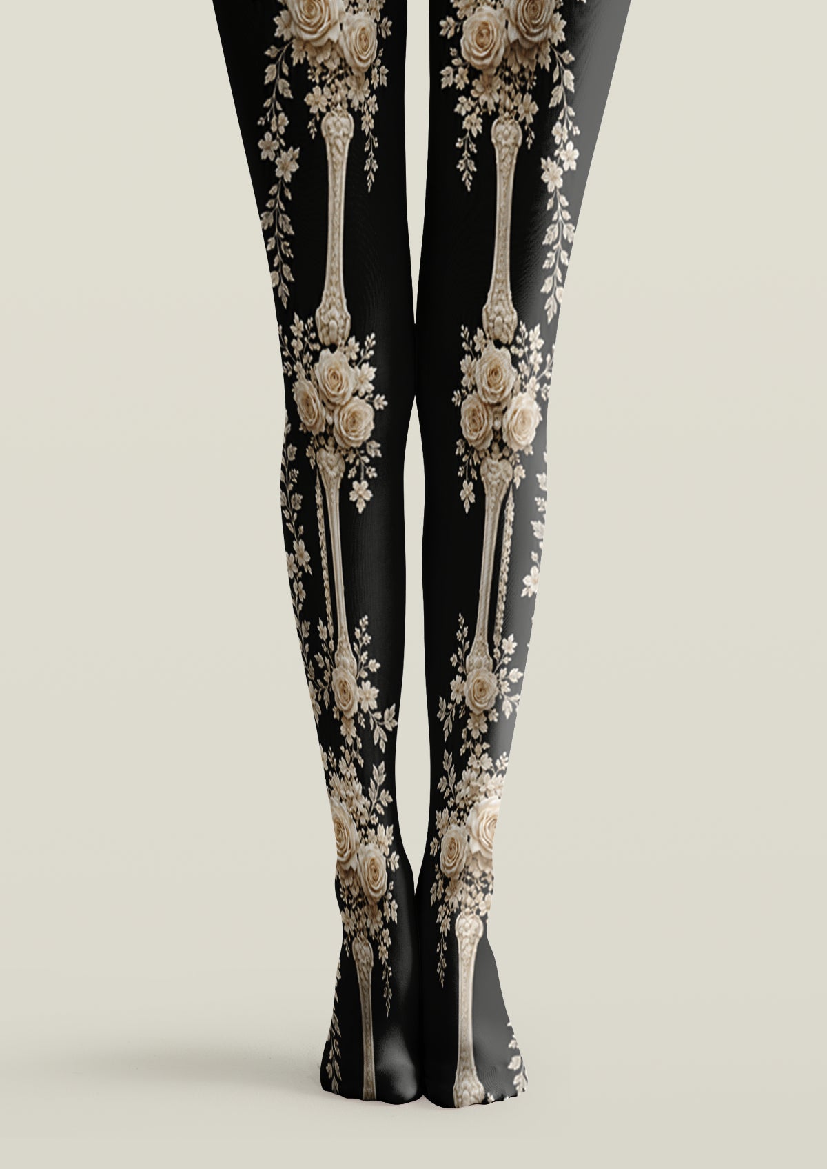 Black printed tights with ivory roses, floral bouquets, and antique decorative motifs across both legs