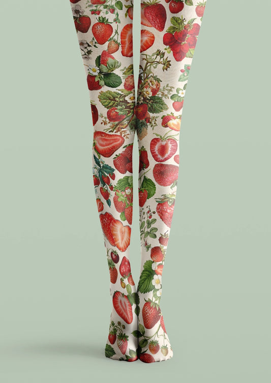 White printed tights with strawberries, strawberry slices, green leaves, vines, and white flowers