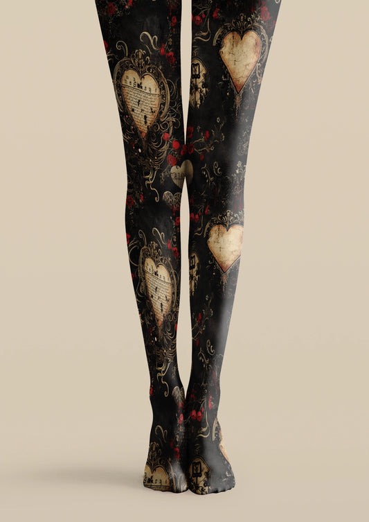 Black printed tights with beige hearts, red roses, ornate scrollwork, and vintage floral details
