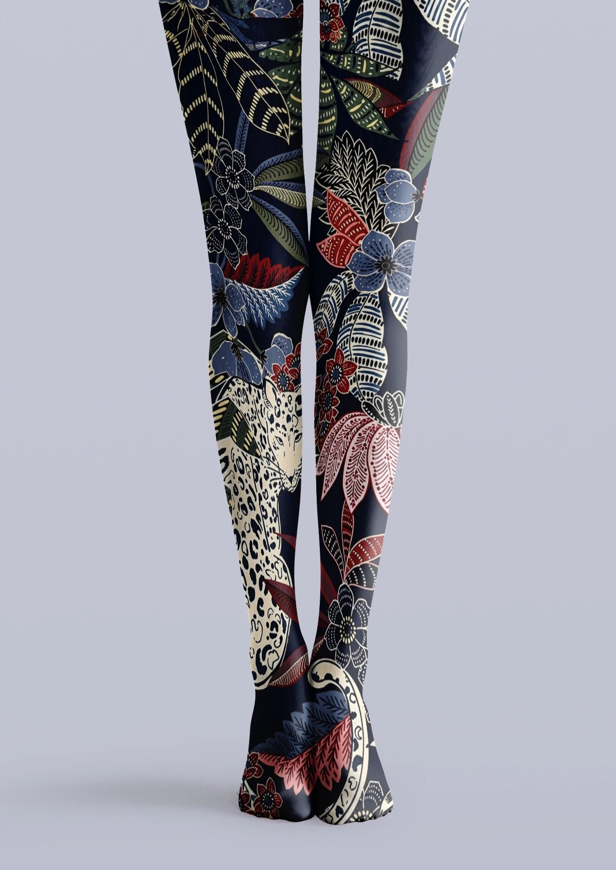 Navy printed tights with leopard motif, tropical leaves, red and blue flowers, and botanical details