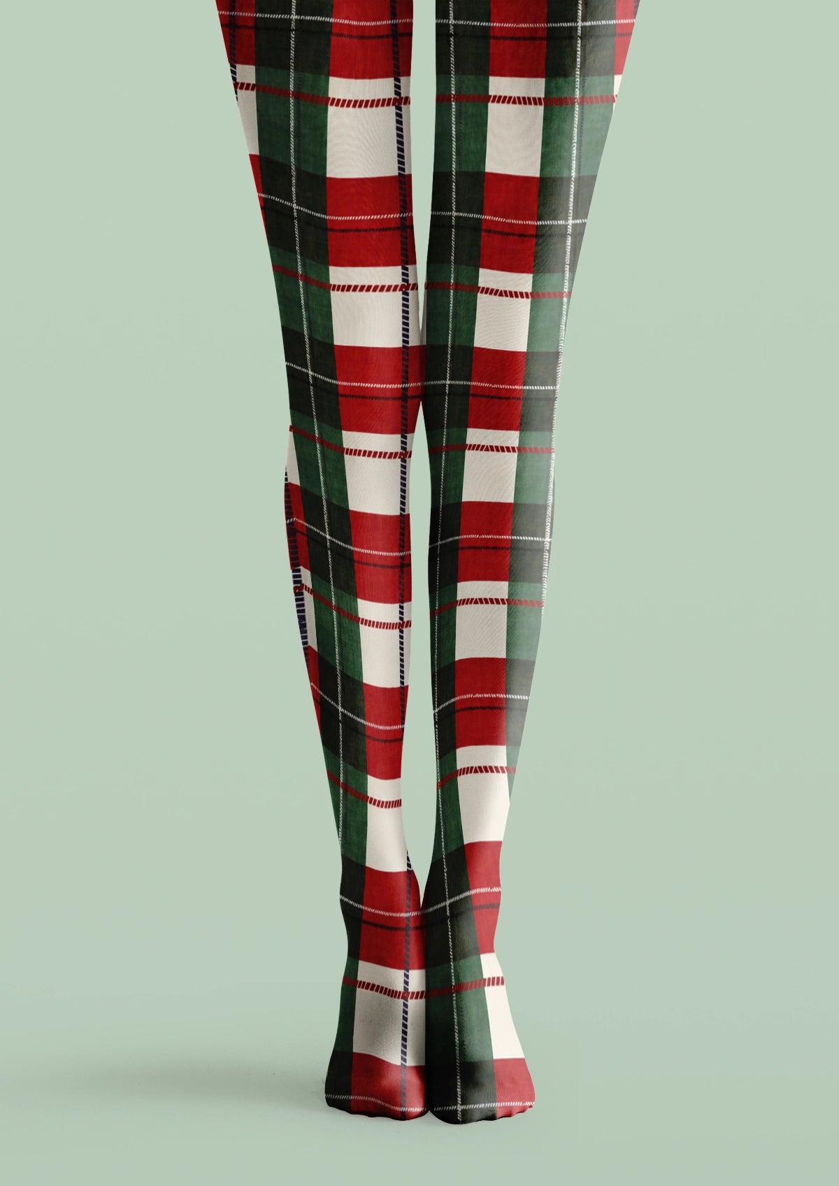 Red and green plaid printed tights with cream blocks and fine black and white intersecting lines.