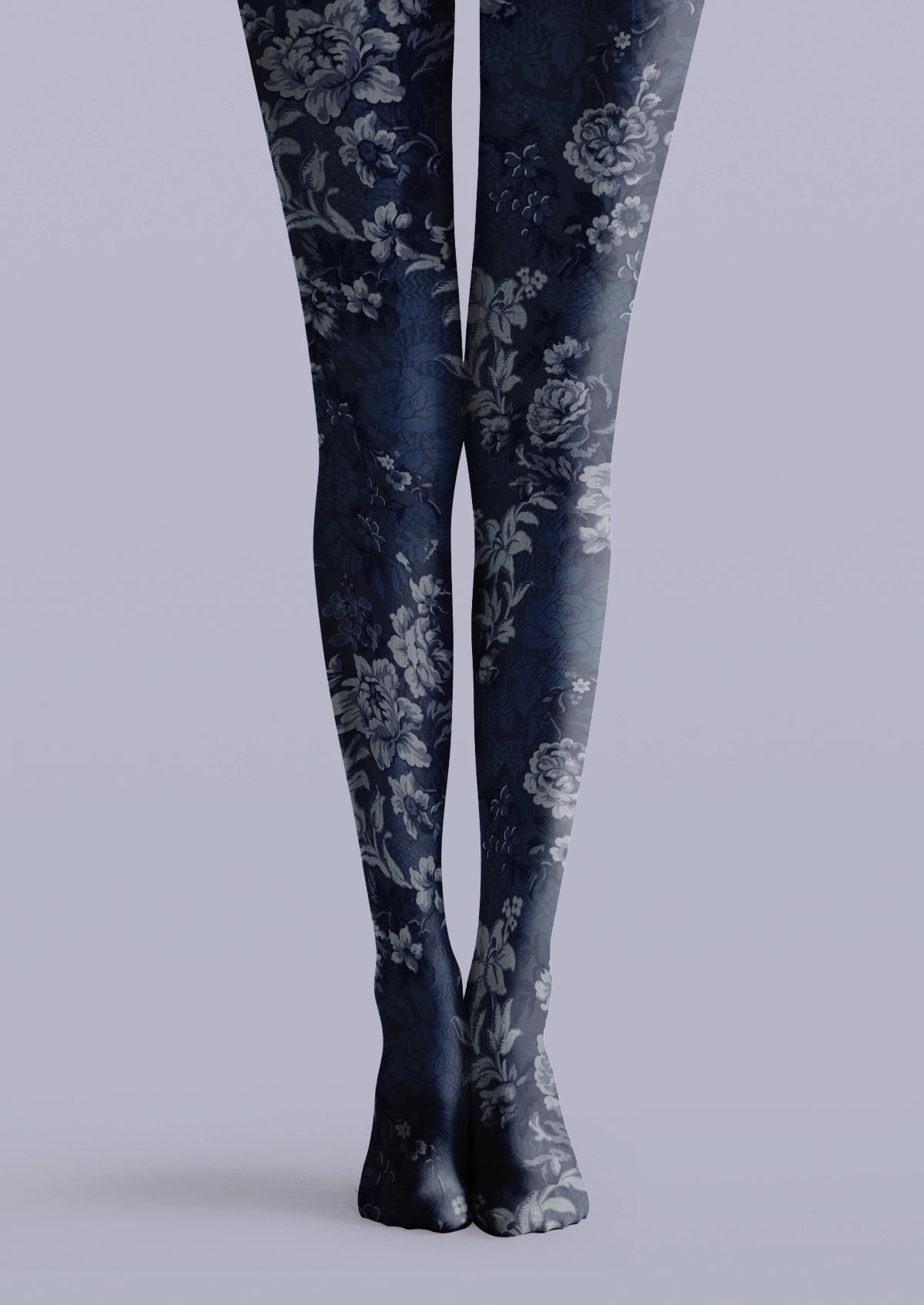 Navy printed tights with gray-blue flowers, layered leaves, and vintage floral details across both legs.