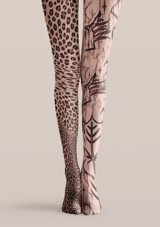Beige printed tights with leopard spots on one leg and black graffiti-style artwork on the other