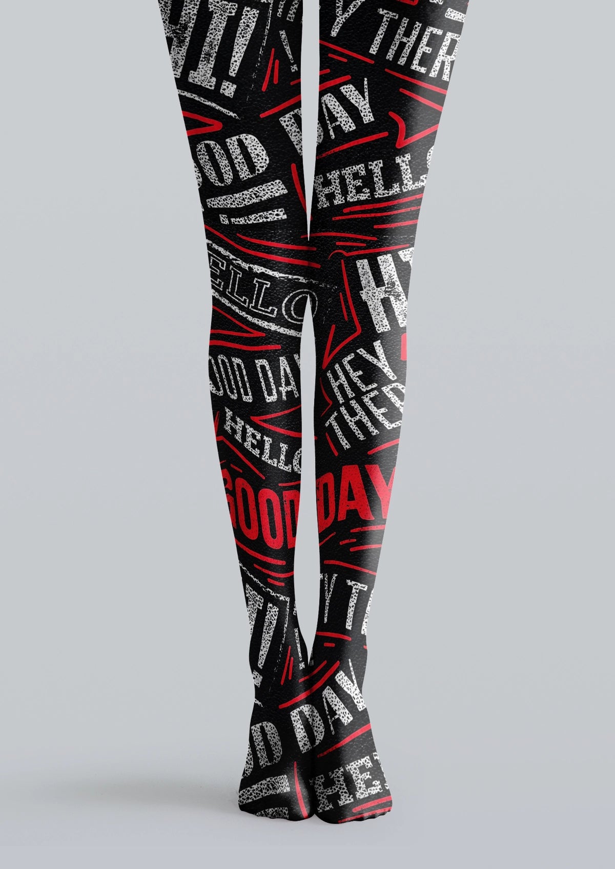 Black printed tights with white and red typography, distressed letters, arrows, and graphic poster elements