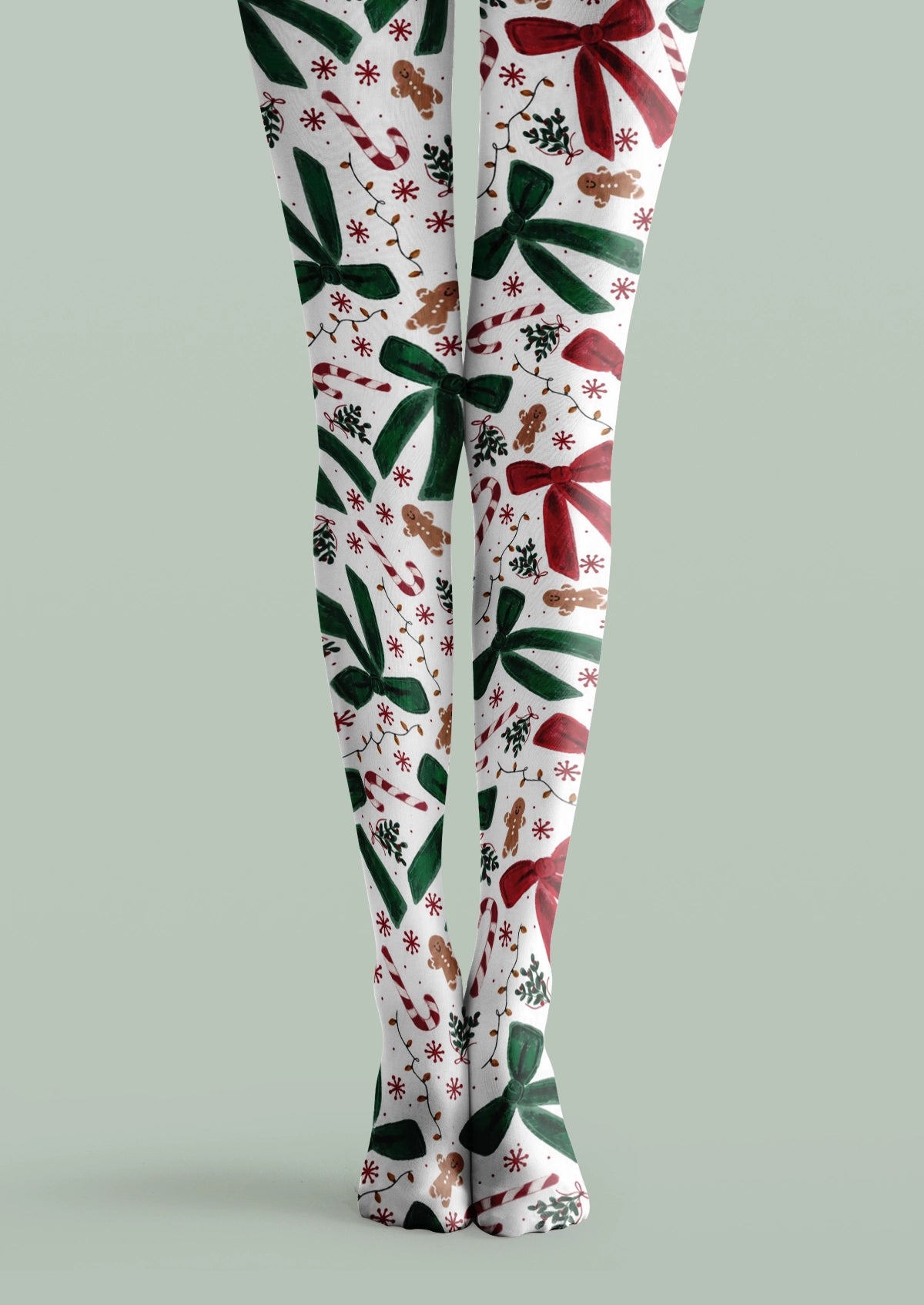 White Christmas printed tights with red and green bows, candy canes, gingerbread figures, snowflakes, and holly sprigs.