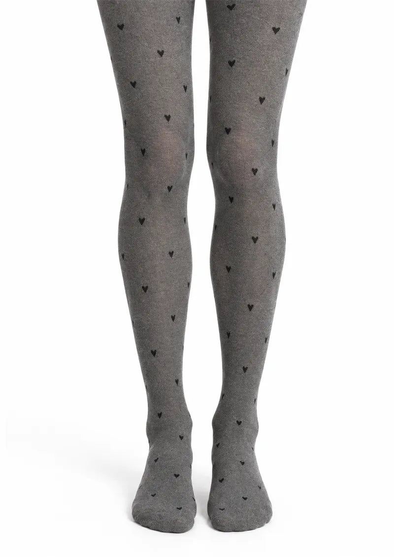 Gray printed tights with evenly scattered small black heart motifs across the legs