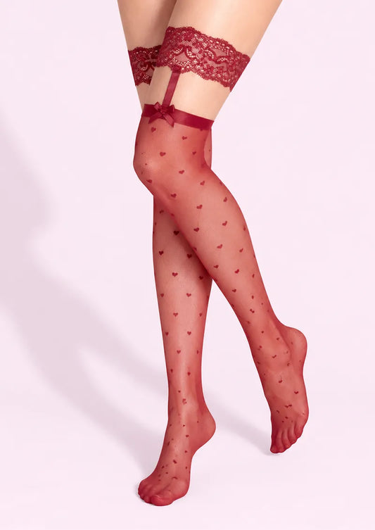 Red printed knee stockings with tiny heart motifs, floral lace tops, and ribbon garter straps with bows.