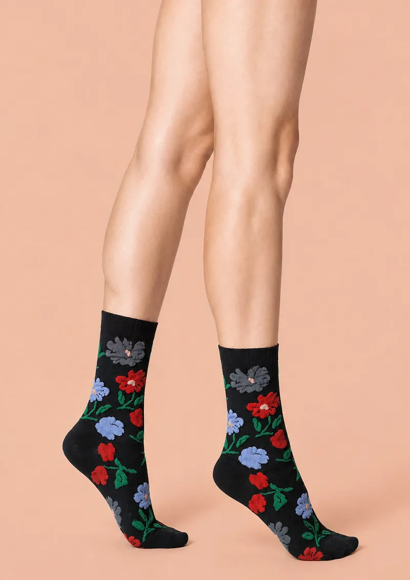 Black printed Crew Socks with red, blue and gray garden flowers and green stems
