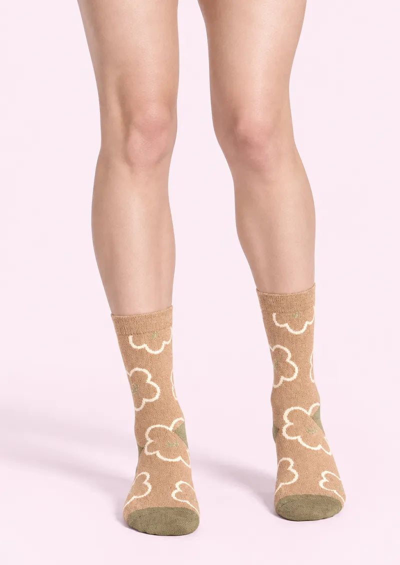 Top view of brown Crew Socks with ivory outlined flowers, green centers, toes and heels.