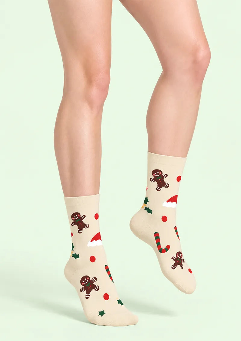 Front view of ivory Crew Socks with gingerbread man, candy cane, holly, and Santa hat motifs
