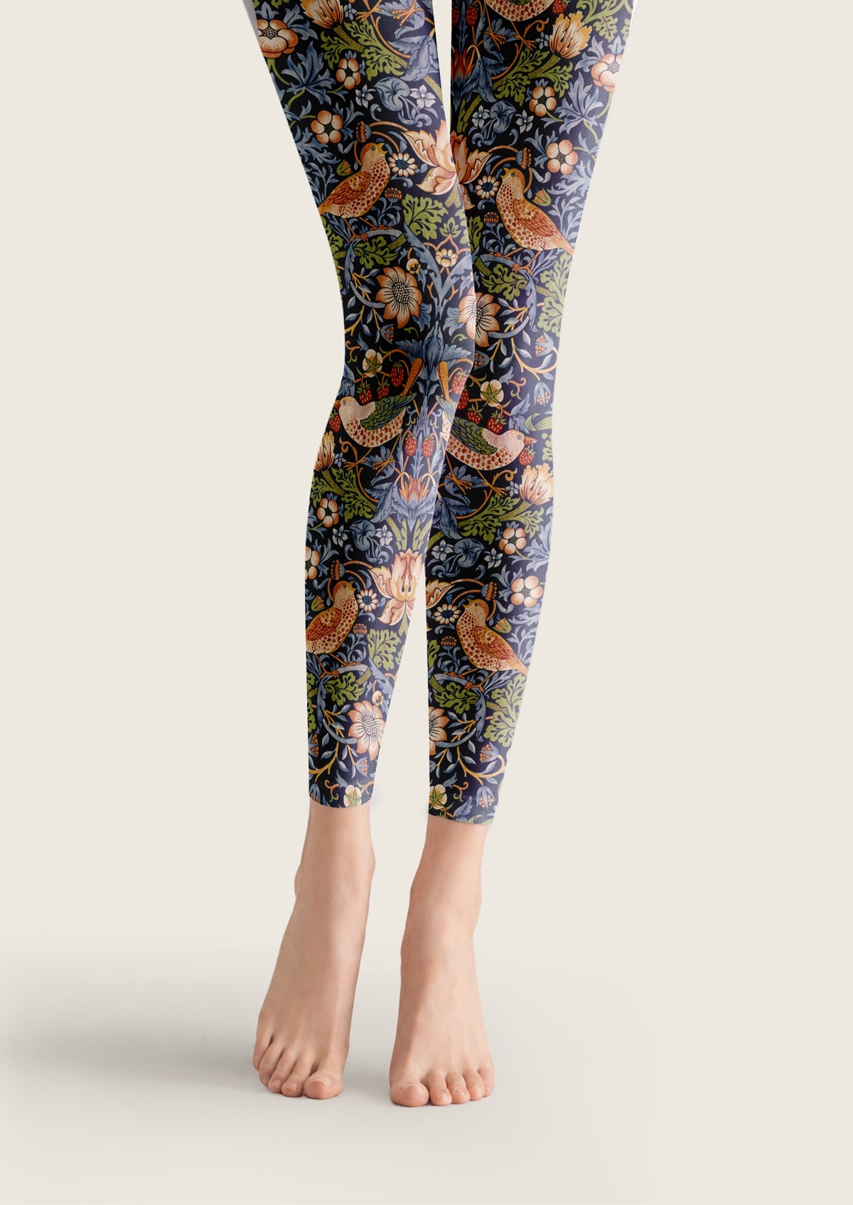 Navy footless tights with William Morris Strawberry Thief birds, strawberries and floral foliage