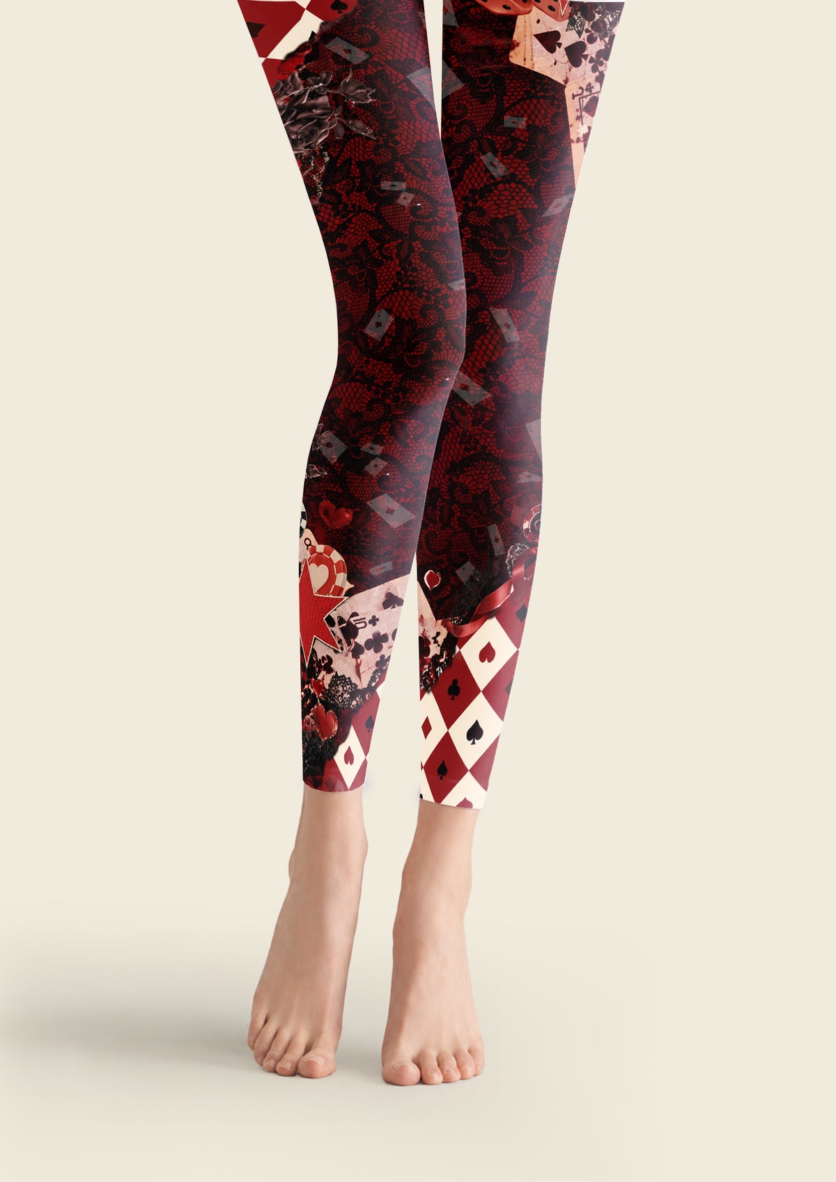 Black and burgundy printed footless tights with playing cards, dice, floral lace patterns and red and ivory diamond panels.