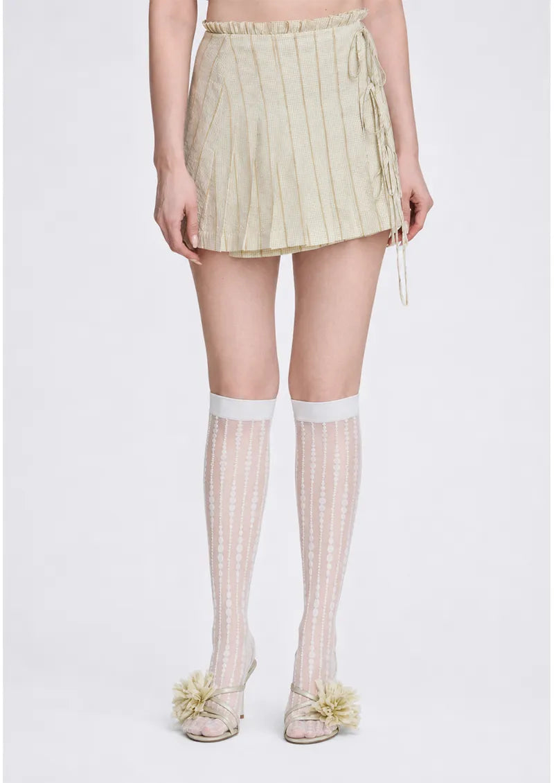 White Dotted Stripe Sheer Knee-High Socks styled with shoes