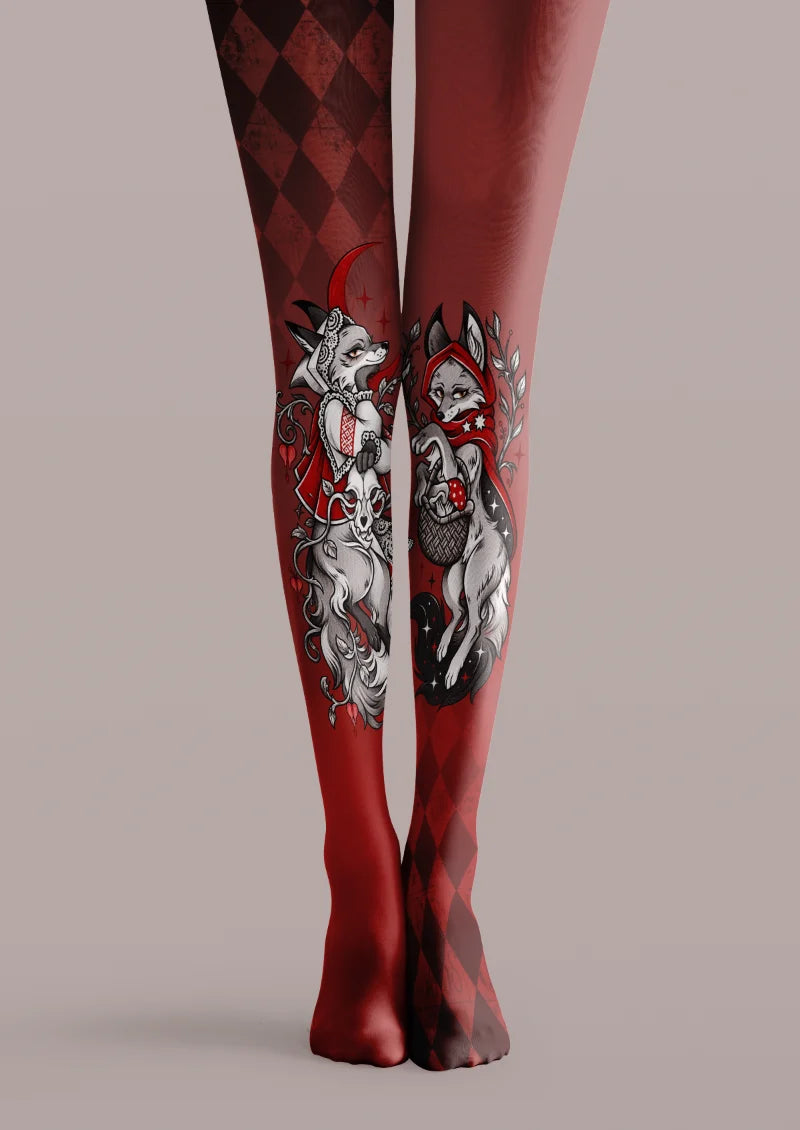 Red printed tights with dark argyle diamonds and illustrated fox-like characters