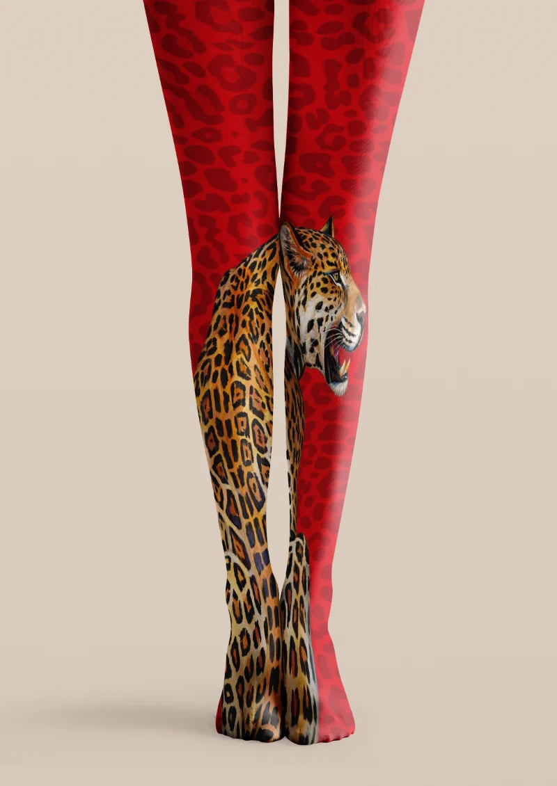 Red printed tights with tonal leopard spots and a large brown and black leopard illustration