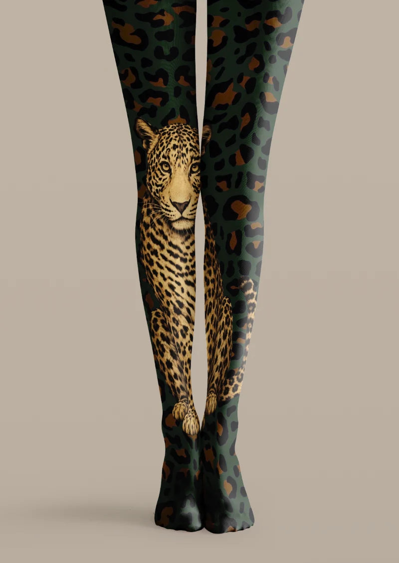 Green printed tights with dark leopard spots and a large illustrated leopard portrait
