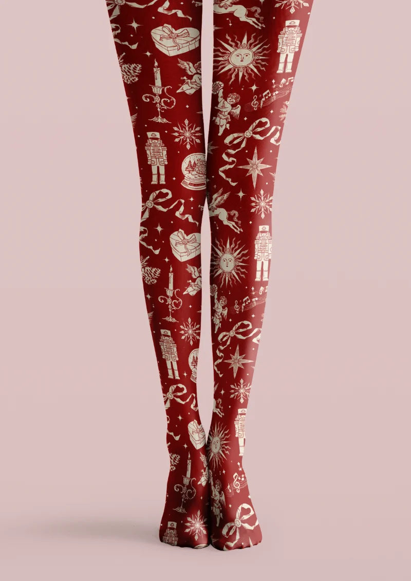 Red printed tights with white nutcrackers, gifts, bows, snowflakes and festive motifs