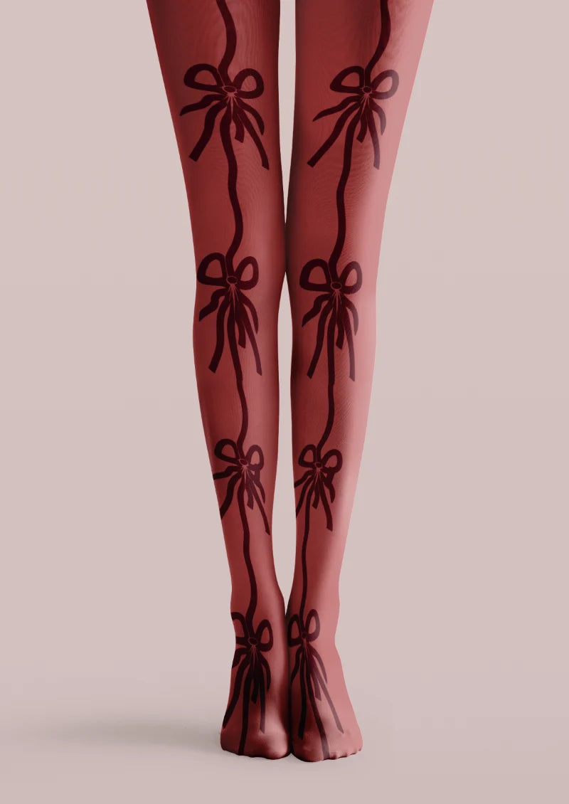 Red printed tights with dark burgundy ribbon bows linked by winding vertical lines.