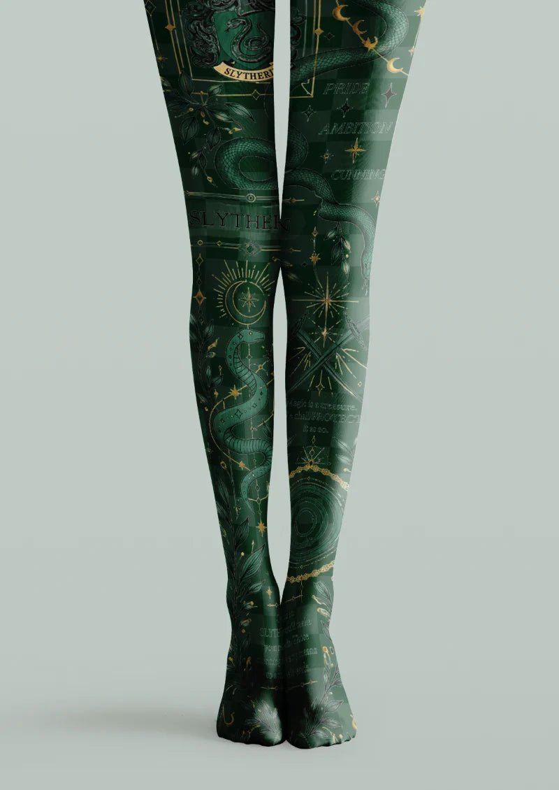 Green printed tights with serpent illustrations, moons, stars and ornate celestial motifs