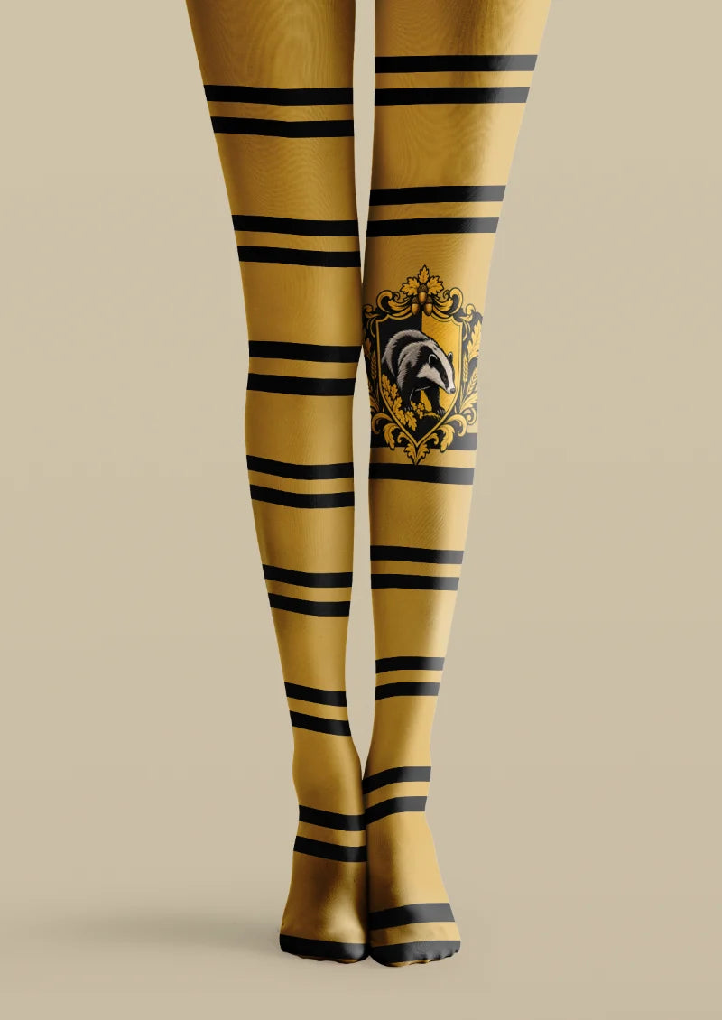 Yellow printed tights with black stripes and an illustrated badger crest motif