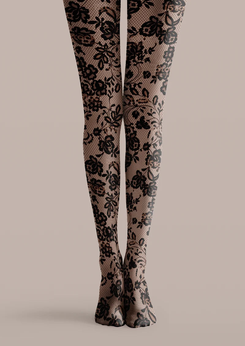 Black printed tights with roses, smaller flowers, curling leafy stems, and a fine lace-effect lattice pattern.
