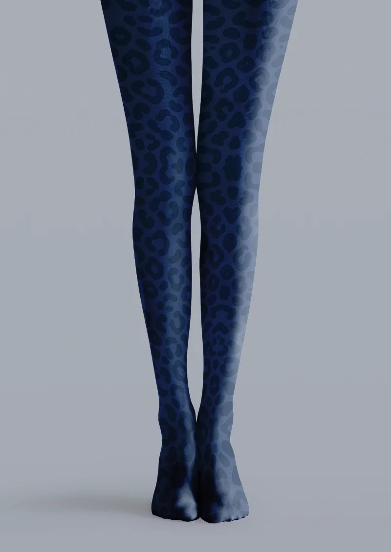 Navy printed tights with darker leopard rosettes and smaller spots across both legs.
